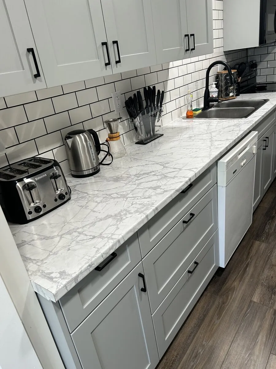 Clean kitchen counters and sink after professional cleaning