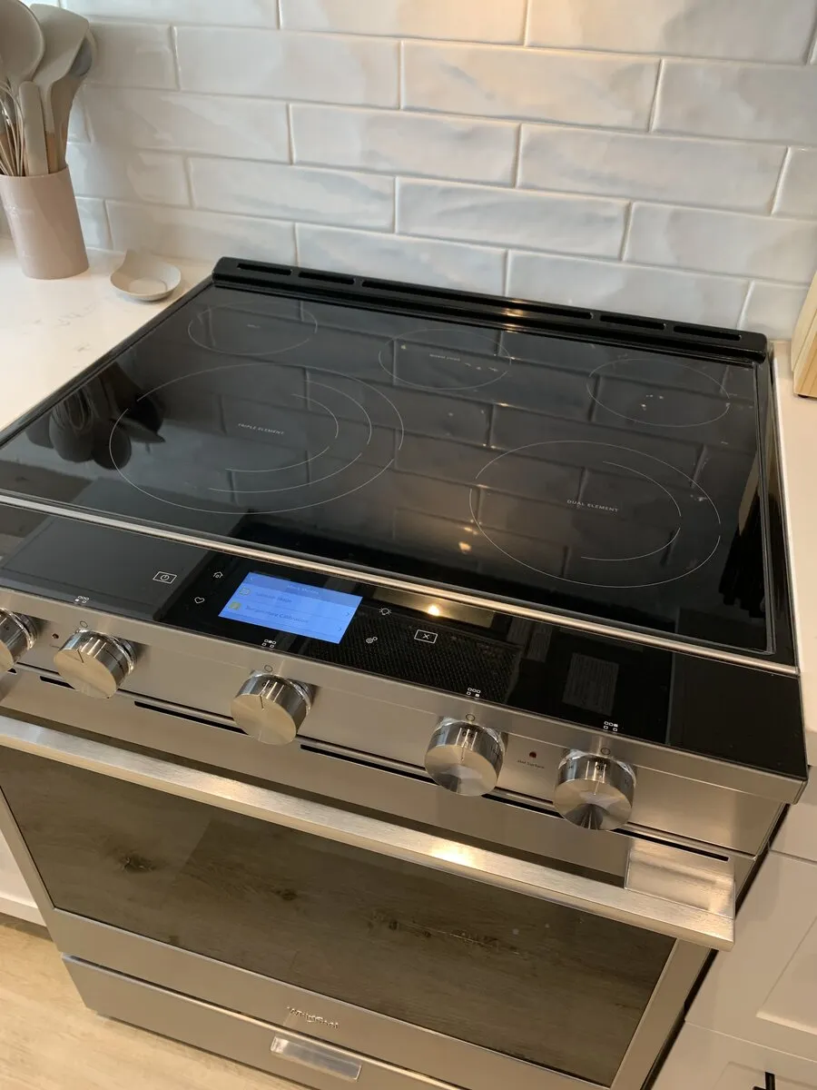 Clean gas cooker after professional appliance cleaning