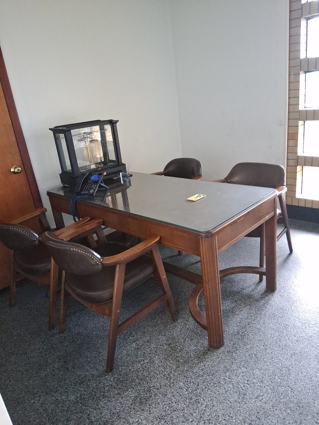 Meeting room included in a commercial cleaning scope Small meeting room with a table and chairs in a Columbus commercial workplace
